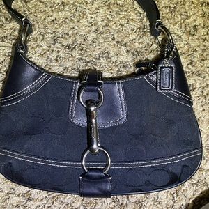 Coach Black Clutch with Sleek Design